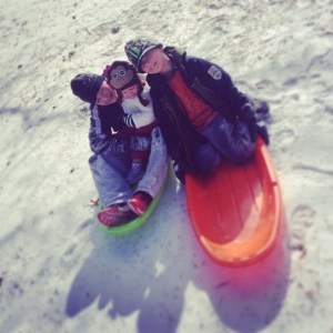 Snow. Sibs Sledding